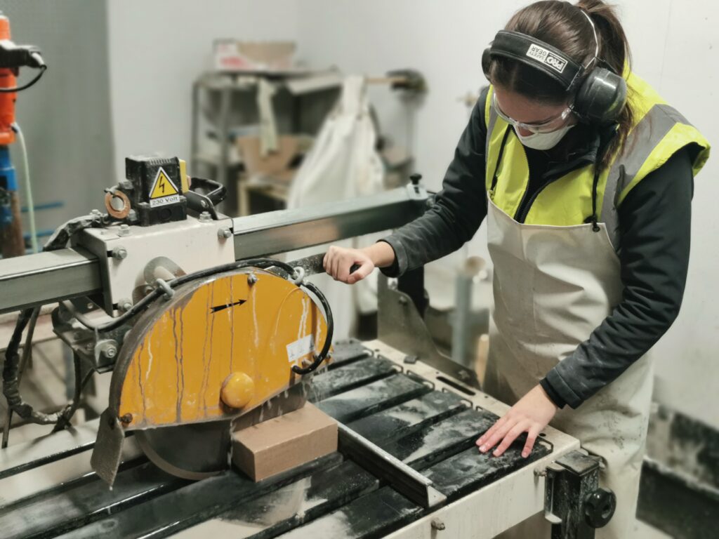 Technician wet cutting stone