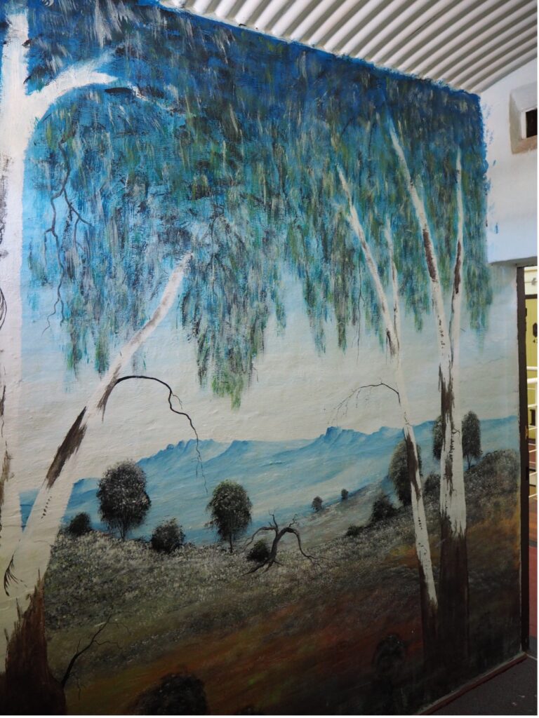Image showing landscape painting in blue and white tones on the wall of Fremantle Prison.